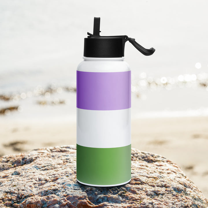 Stainless steel water bottle with a Genderqueer Pride Flag printed around it, on a rock with a beach background. By The Rainbow Stores