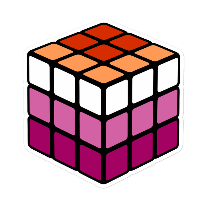 An illustration of a Rubik's Cube with the individual panels in the coloured  stripes of the Lesbian Pride Flag. By The Rainbow Stores
