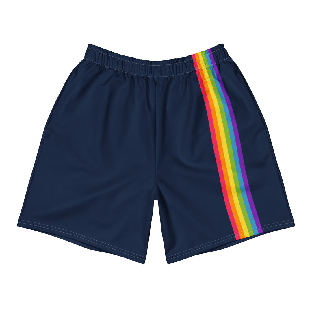 A pair of dark blue long shorts with contrast white stitching and a vertical stripe on the front left leg in the six colours of the classic Rainbow Pride flag.  