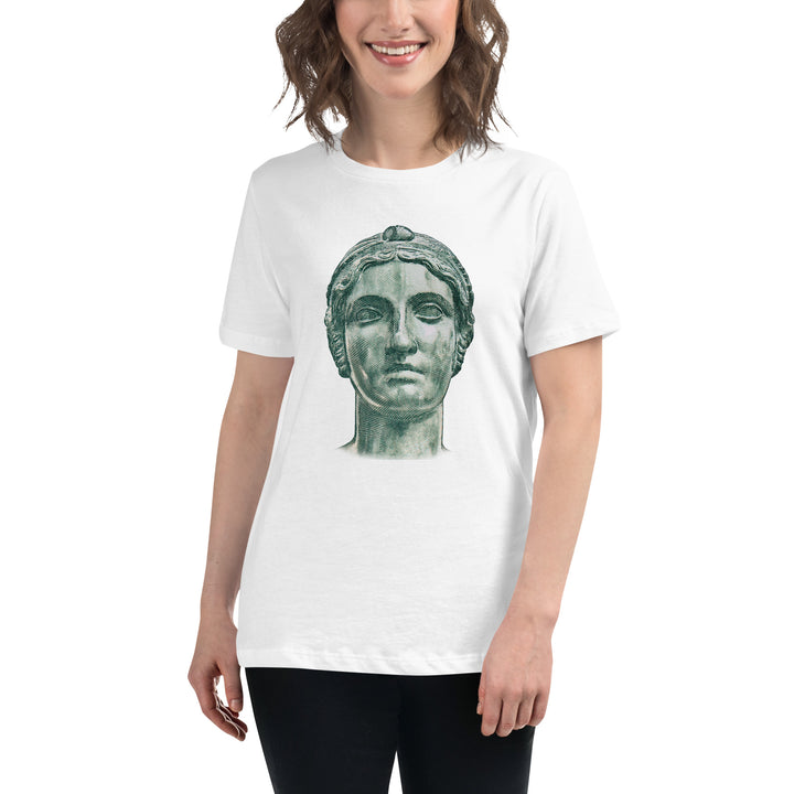 A person with long brown hair is wearing a white t-shirt, with an illustration of the head of the poet Sappho on the front in green