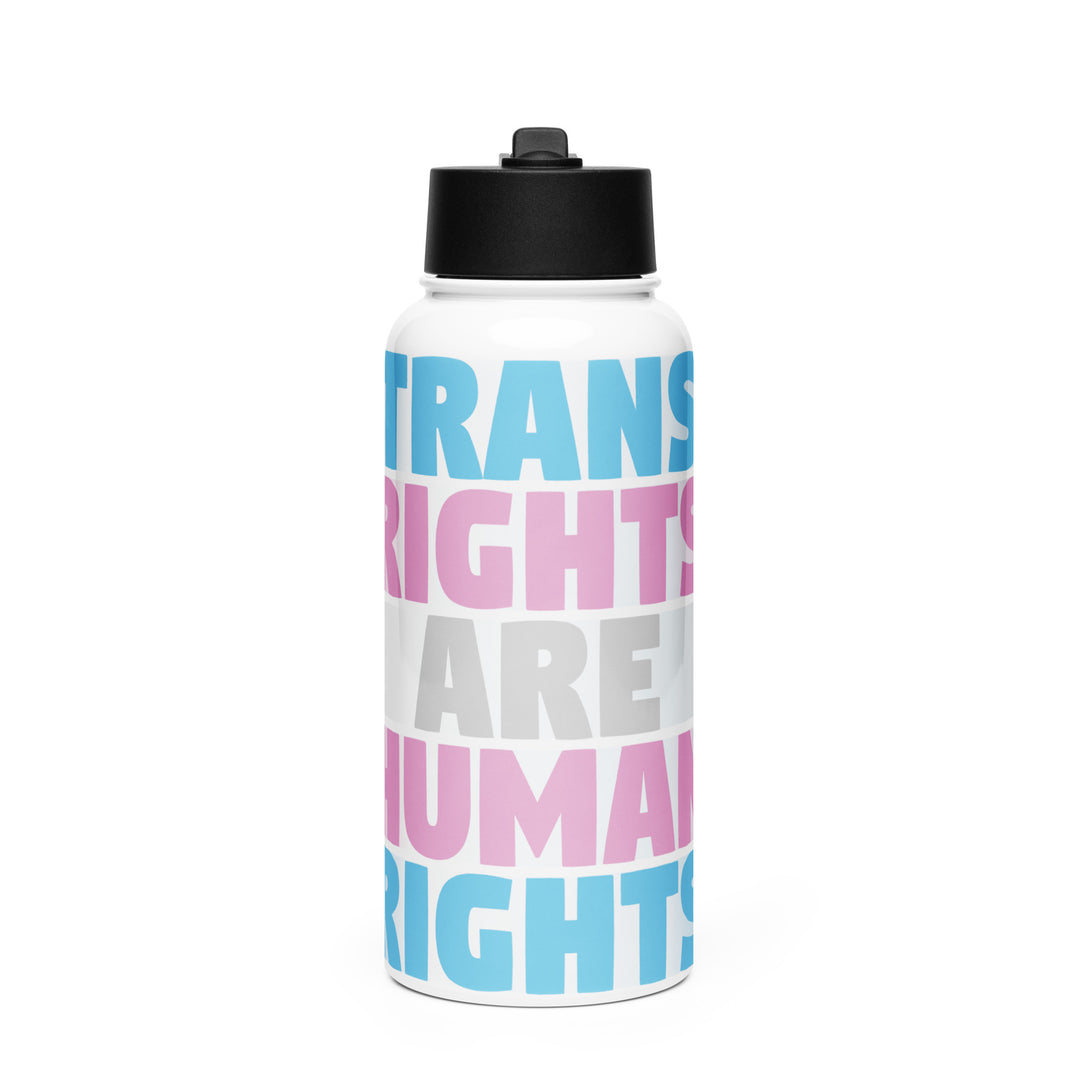 Stainless steel water bottle with a Trans Pride Flag printed around it and Trans Rights Are Human Rights written in the colours of the stripes, one word within each stripe, on a white background. By The Rainbow Stores
